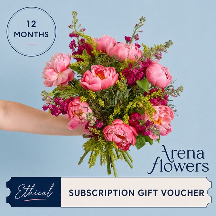 A hand holding a bouquet of pink peonies and greenery with an Arena Flowers 12-month subscription gift voucher