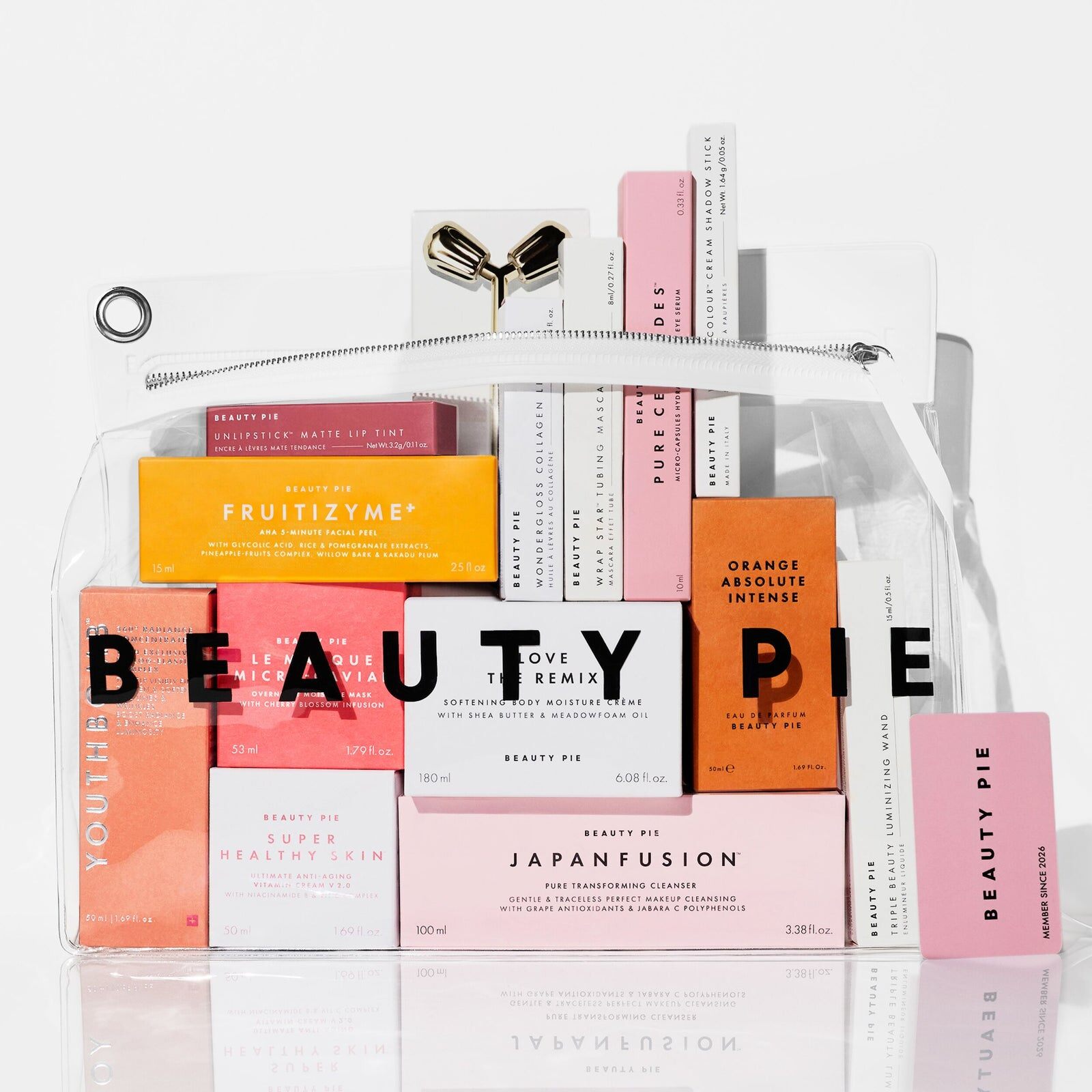 The Beauty Pie Better Than An Advent Calendar 2026 products packed in a clear Beauty Pie bag with their boxes behind