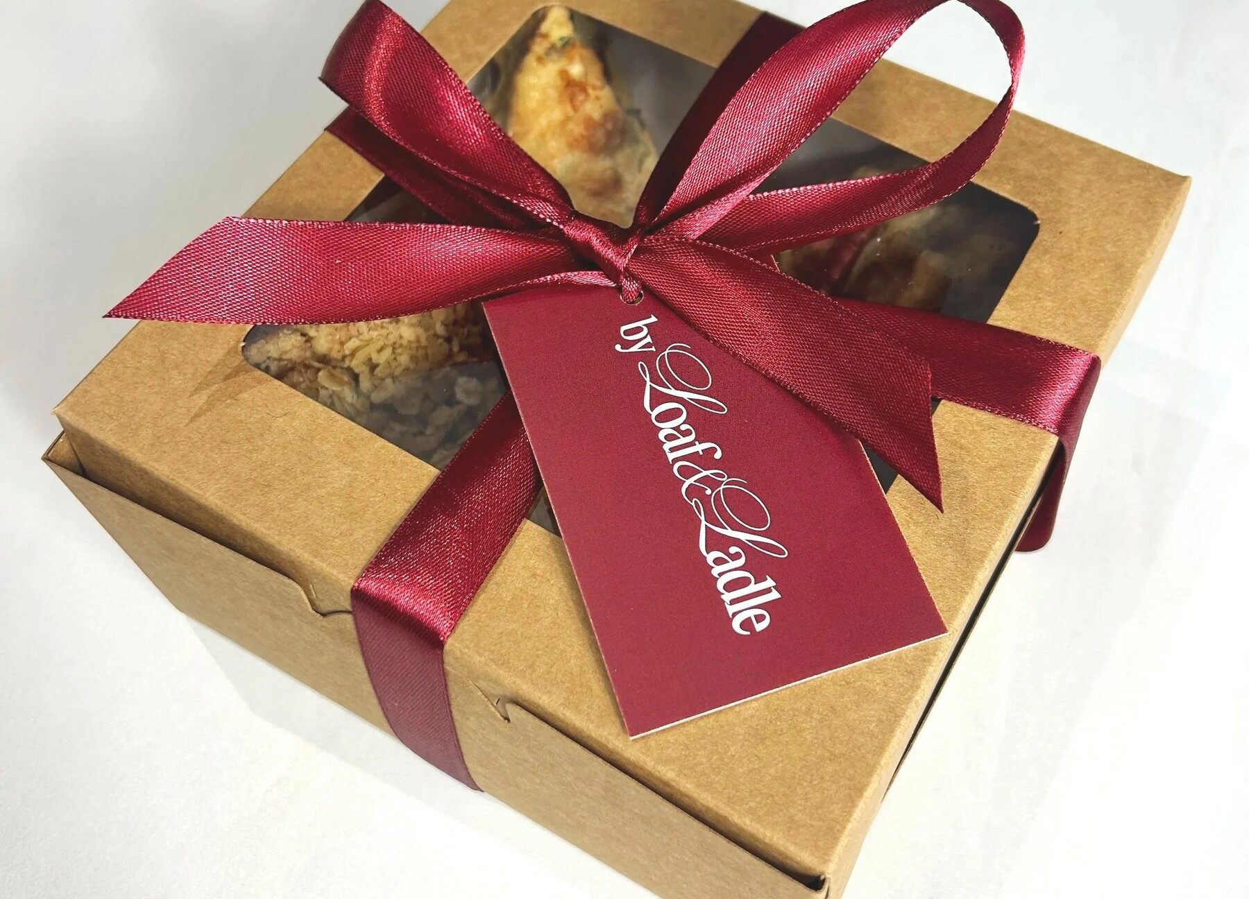 By Loaf & Ladle wrapped bake box with ribbon