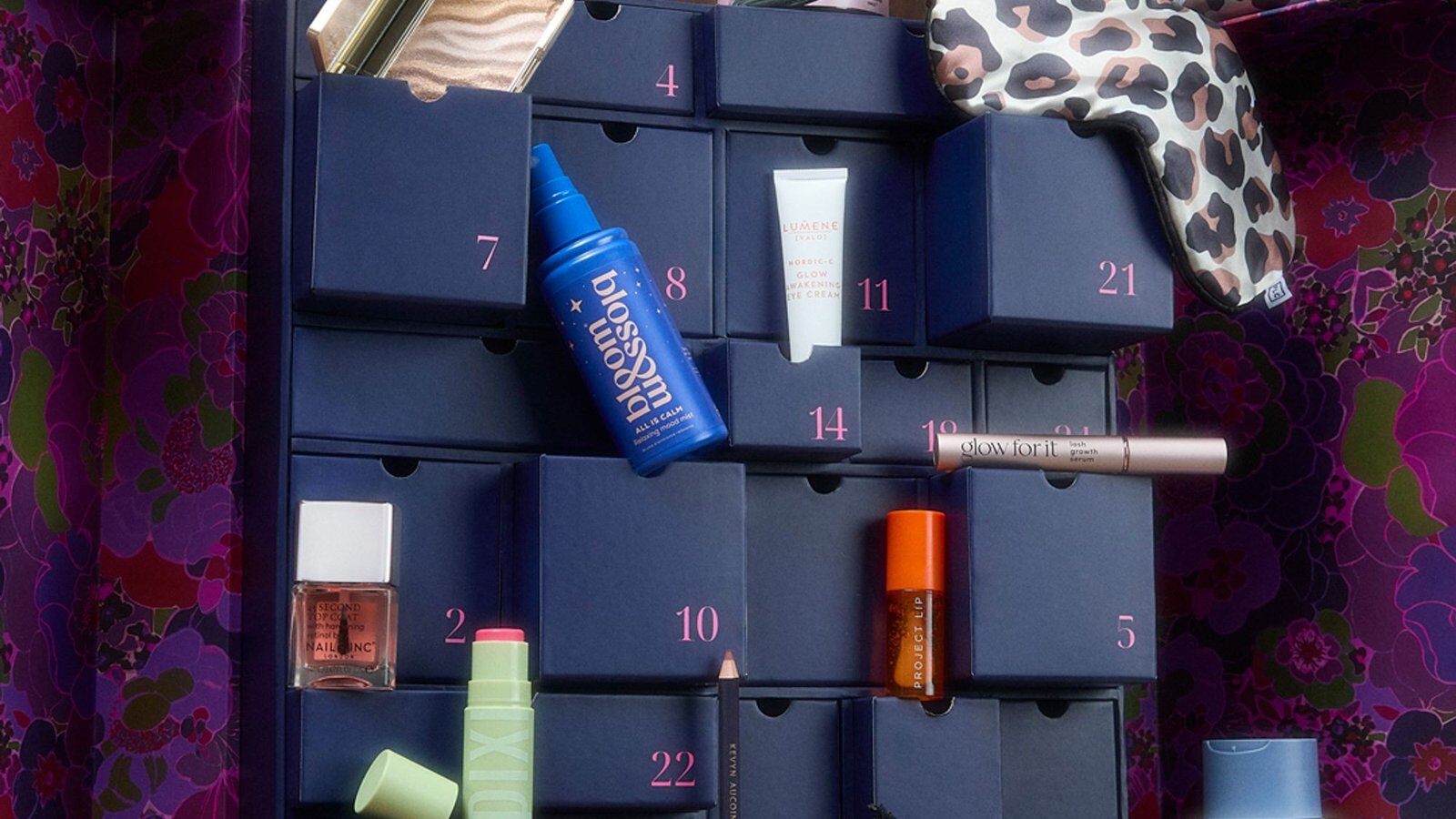 The open Debenhams Beauty Advent Calendar 2026 with numbered navy drawers and beauty products