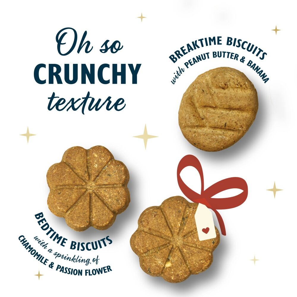Lily's Kitchen Breaktime and Bedtime biscuits, round flower-shaped dog biscuits with a festive tag