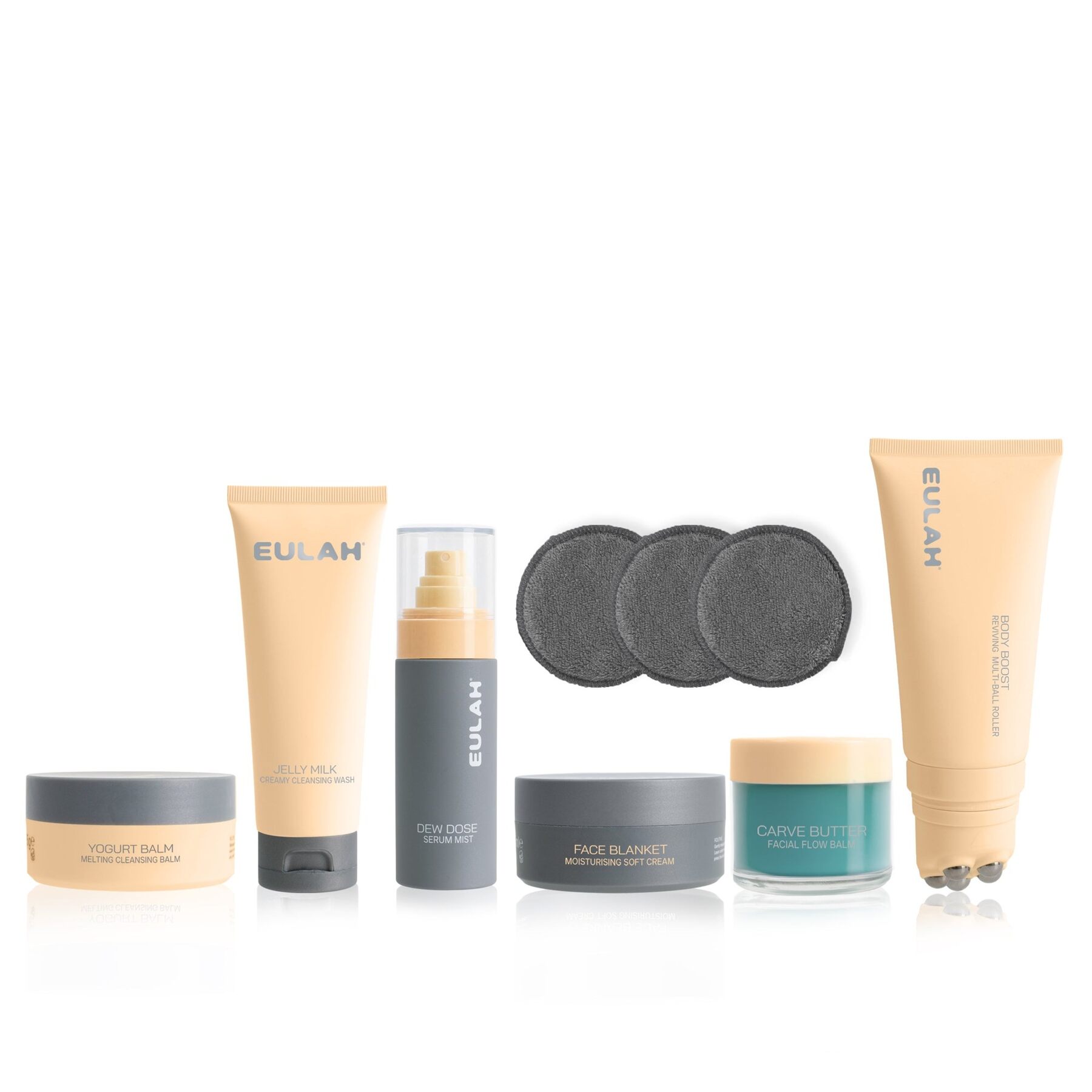 Eulah skincare in butter yellow and grey packaging lined up on a white background