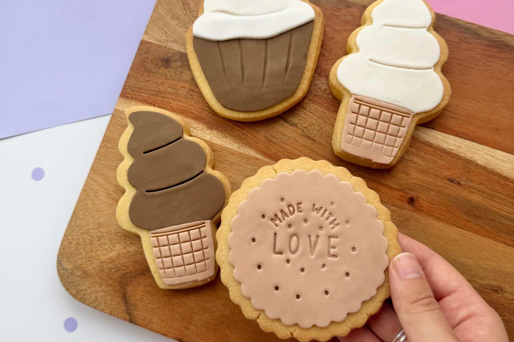 Iced shortbread cookies from Gardners Cookies on a wooden board
