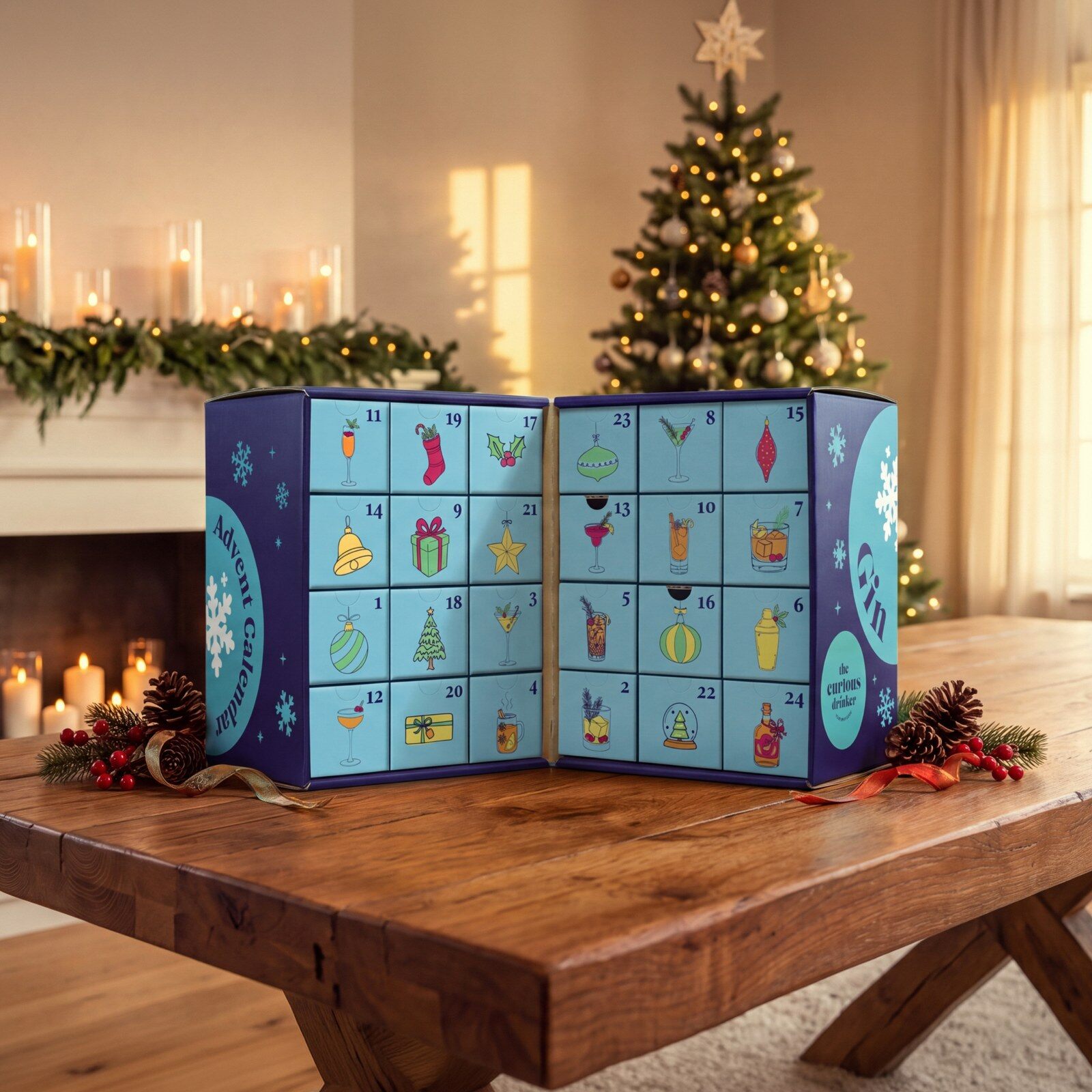 The Curious Drinker gin advent calendar standing open on a wooden table in front of a Christmas tree, its blue doors showing gin bottles
