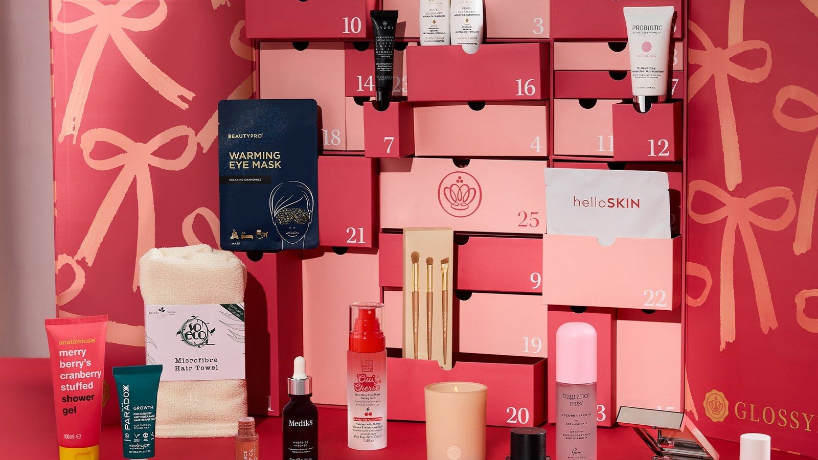 The GLOSSYBOX 2026 advent calendar with its drawers open and products on display