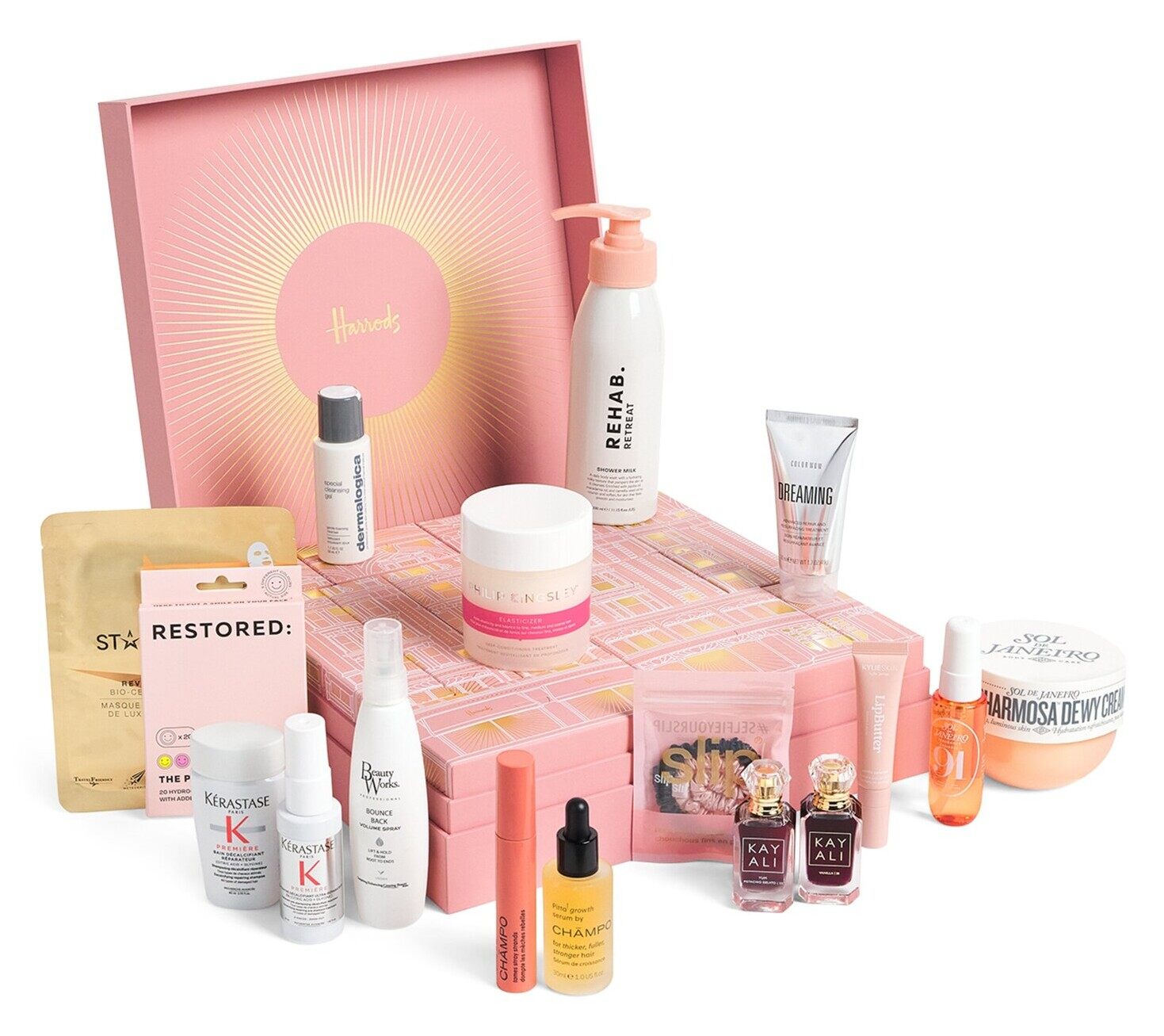 The Harrods 12 Days of Hair and Body advent calendar 2026 open, with REHAB., Kérastase, Sol de Janeiro and Kayali products around the pink box