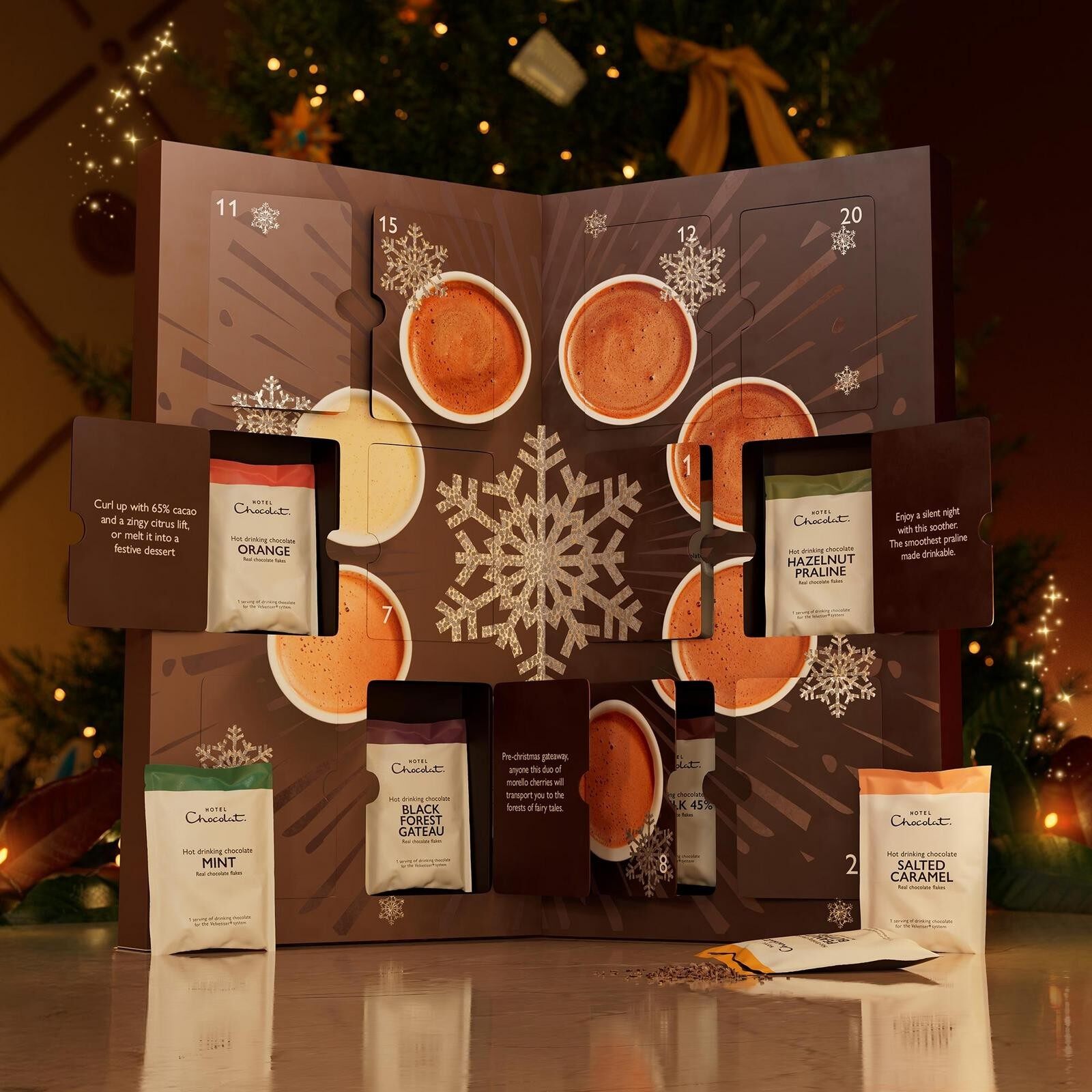 The Hotel Chocolat Velvetiser Drinking Chocolate Advent Calendar open with drinking chocolate sachets and cups