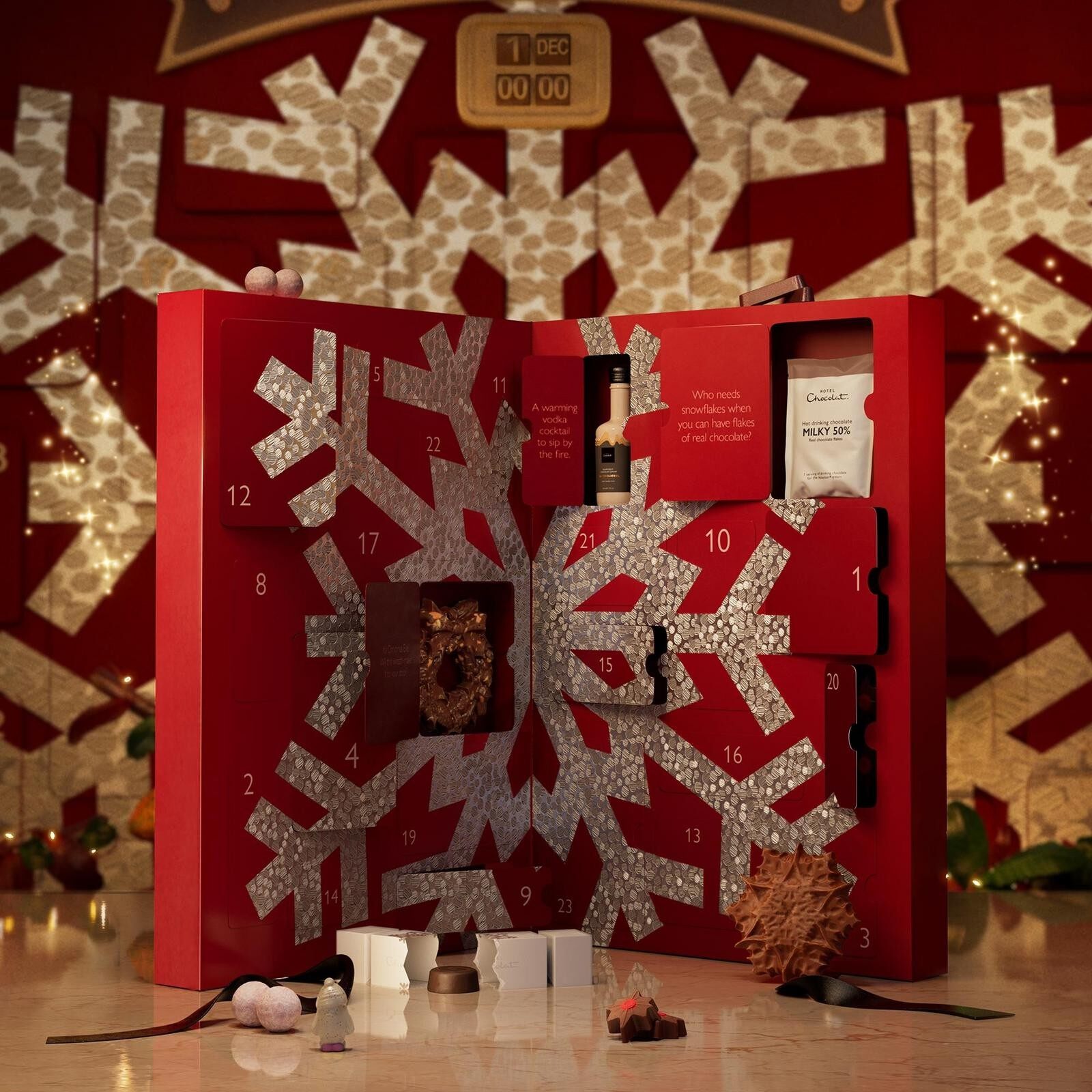 The Hotel Chocolat Grand Advent Calendar 2026 open in red and silver, with chocolate treats behind its large doors