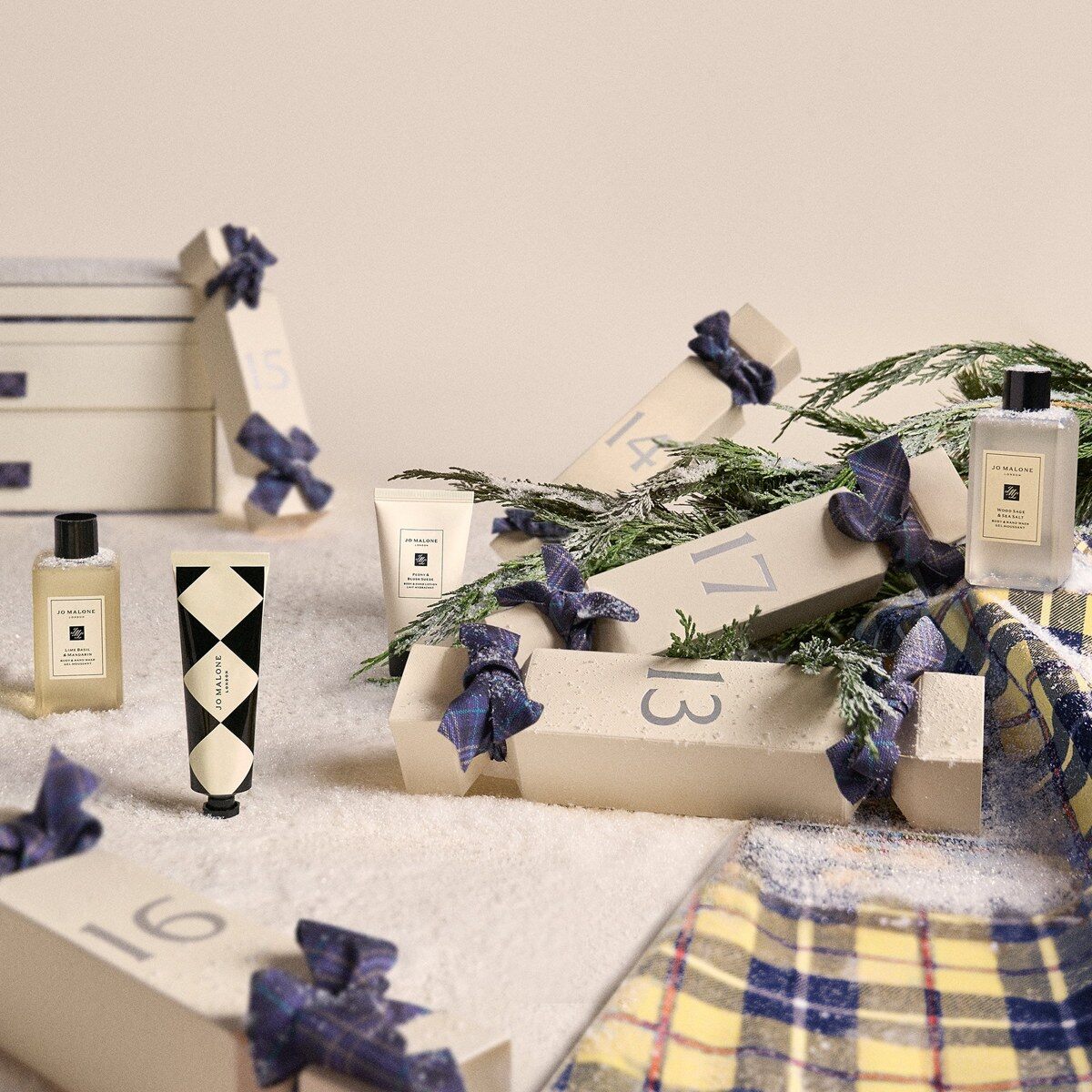 Jo Malone London advent calendar 2026 tartan crackers with cologne bottles and pine branches