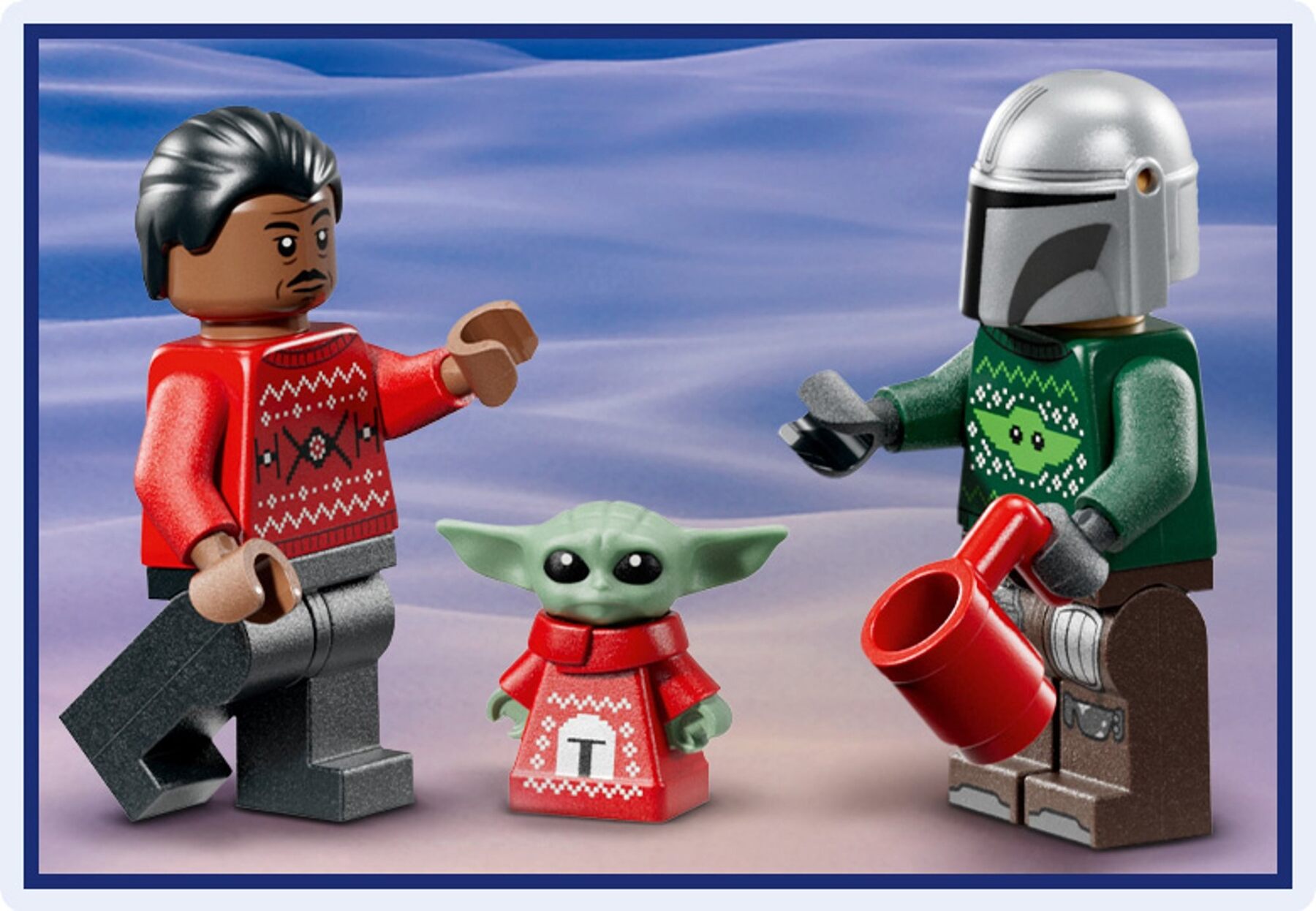 Grogu and Mandalorian minifigures in Christmas jumpers from the LEGO Star Wars advent calendar