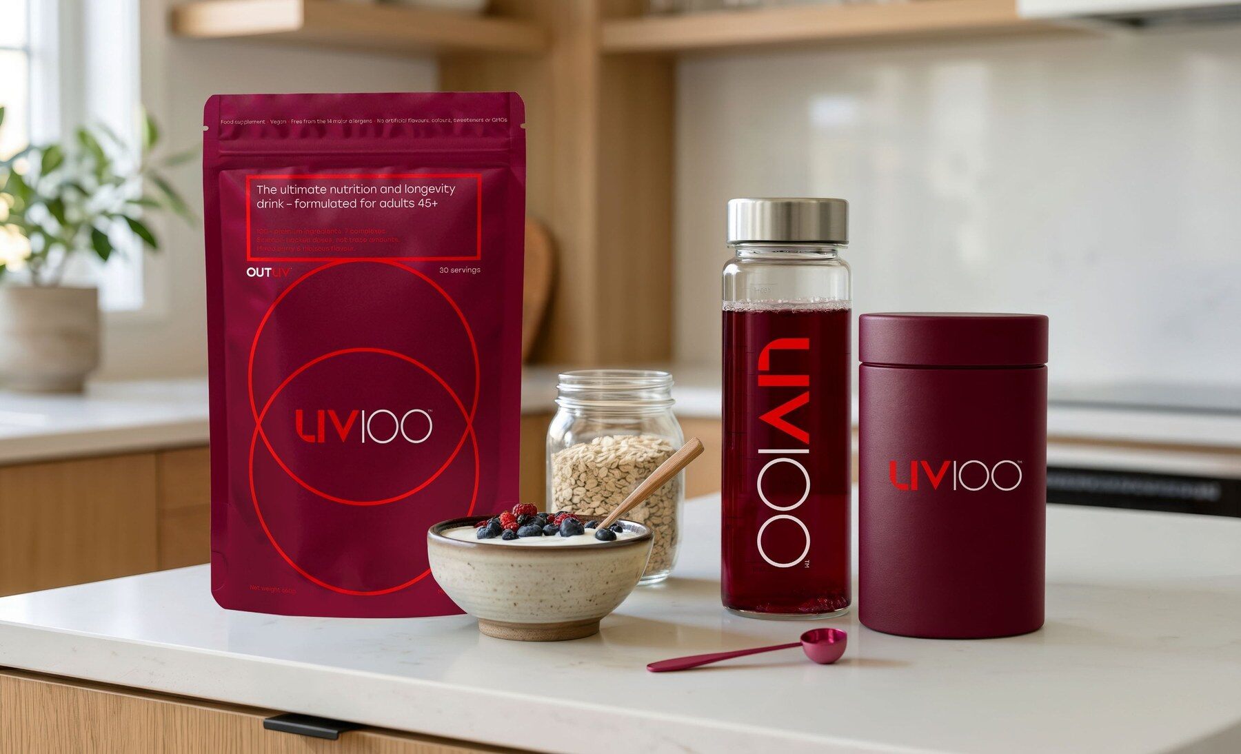 Liv100 pouch, glass shaker and storage tin on a kitchen worktop