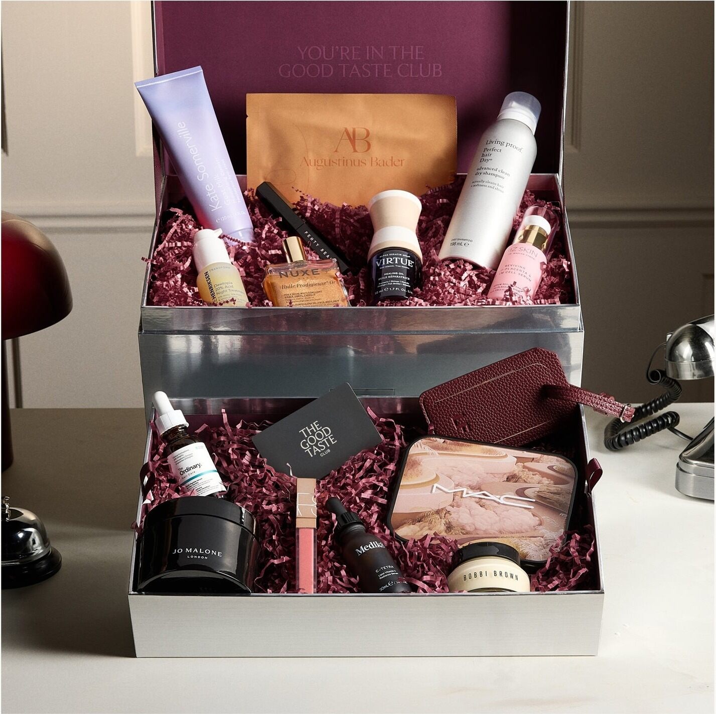 The open LOOKFANTASTIC Beauty Vault on two tiers, with Kate Somerville, Augustinus Bader, NUXE, VIRTUE and Living Proof on top and Jo Malone London, Medik8, MAC and Bobbi Brown below