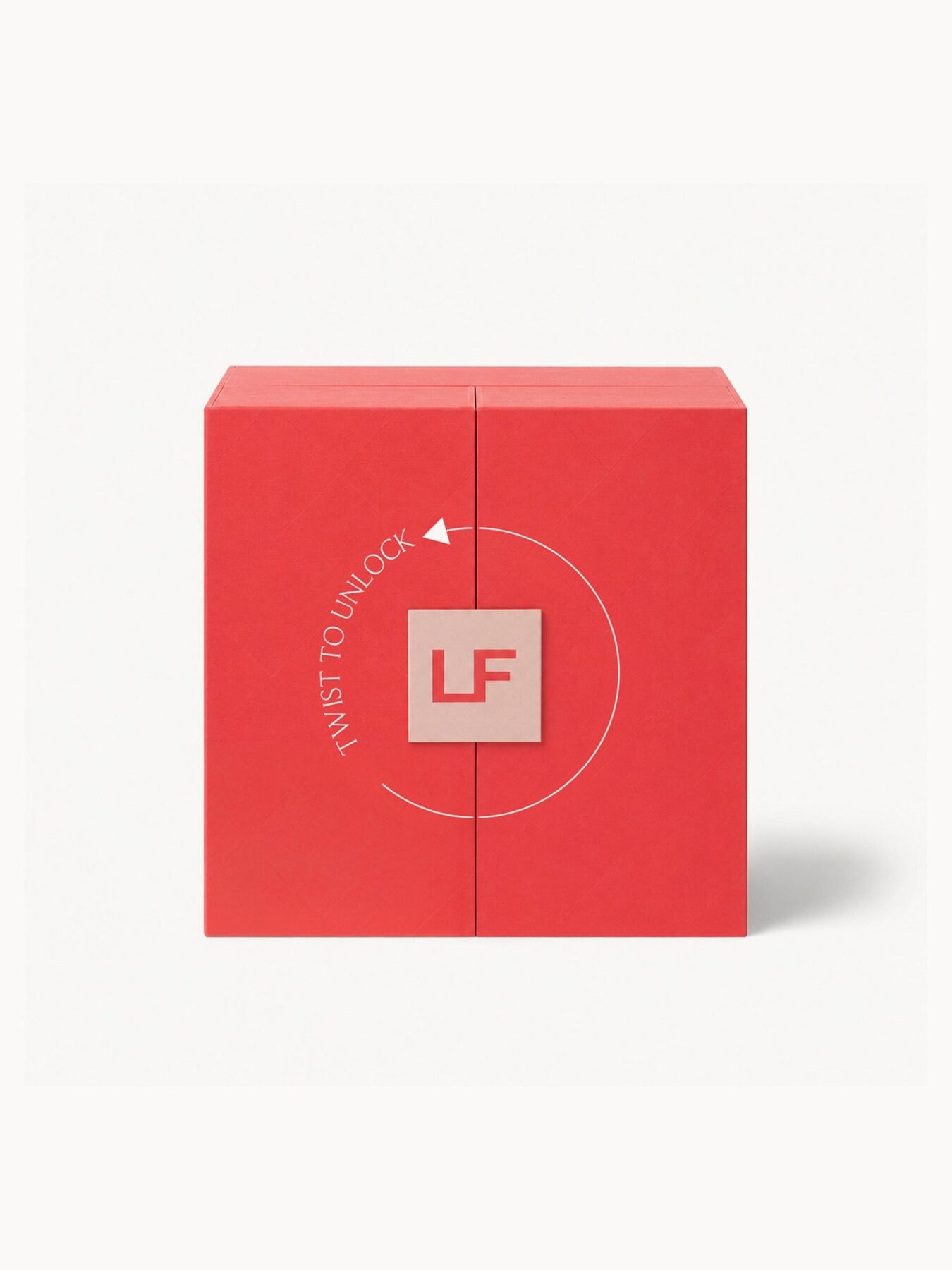 The closed LOOKFANTASTIC Fragrance advent calendar 2026, a red box with the LF logo and the words twist to unlock