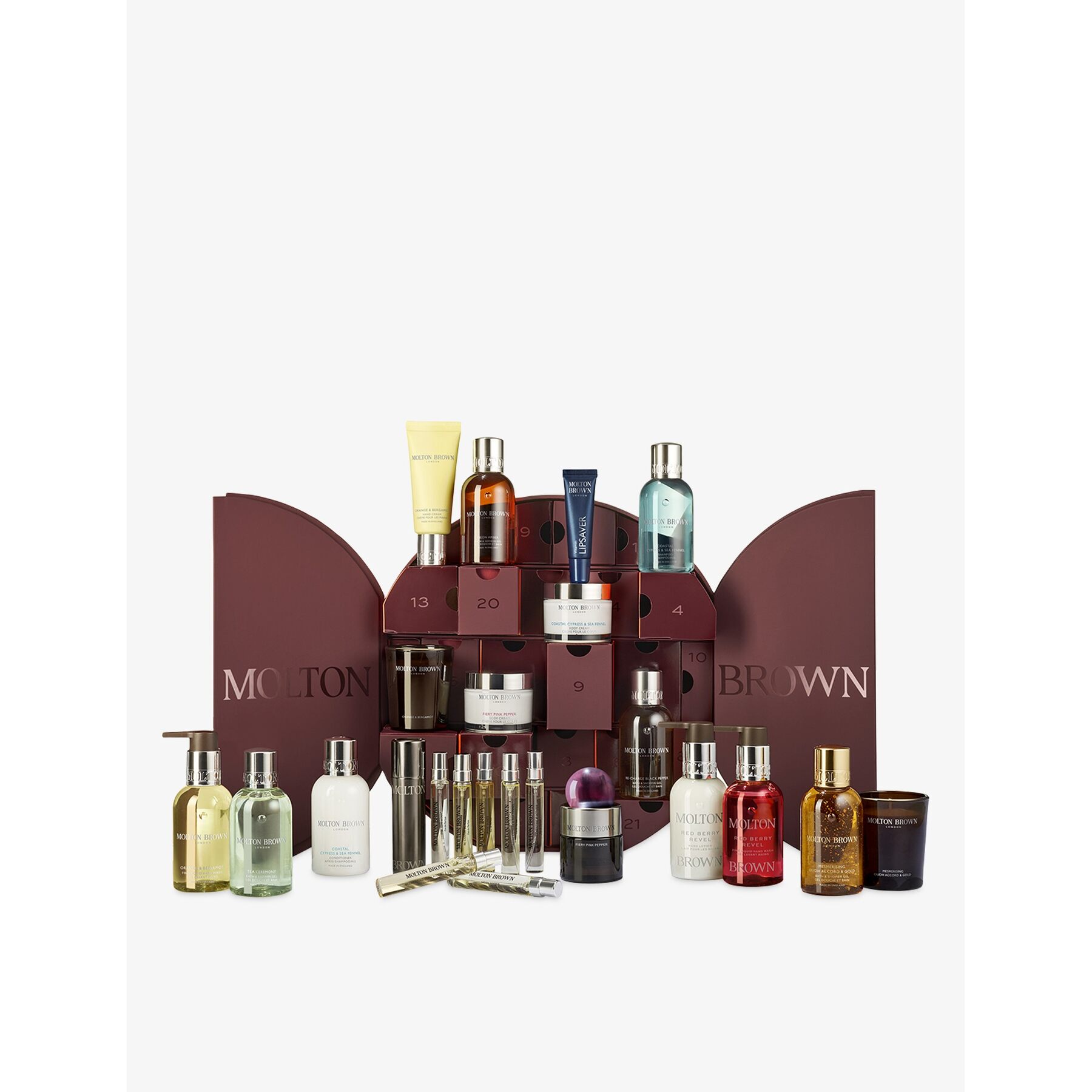 The Molton Brown Decadent Delights advent calendar 2026 open, with its fragrances, shower gels, hand washes and candles arranged in front