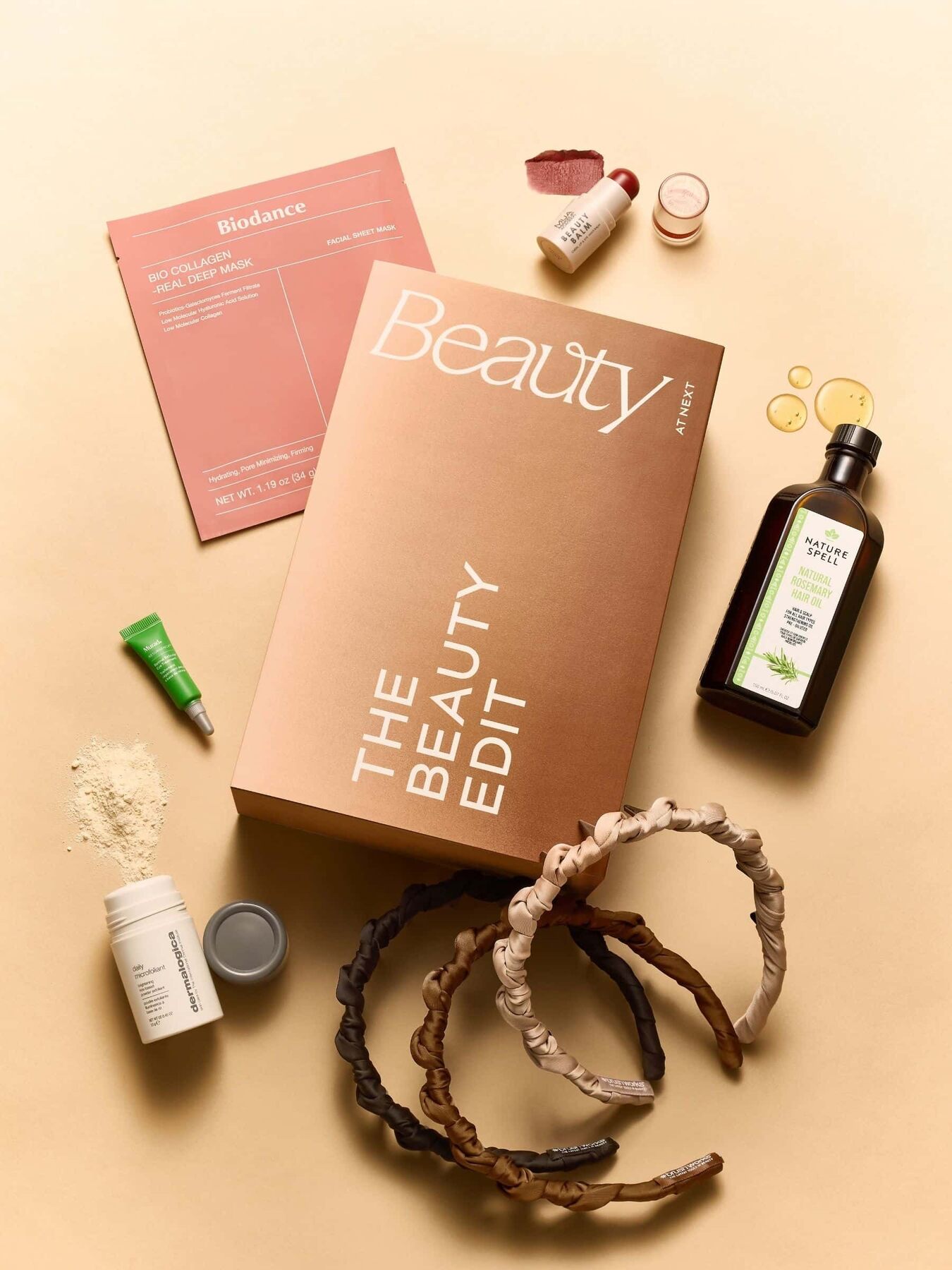 The Next Beauty Edit box with Dermalogica, Murad and Biodance products and headbands