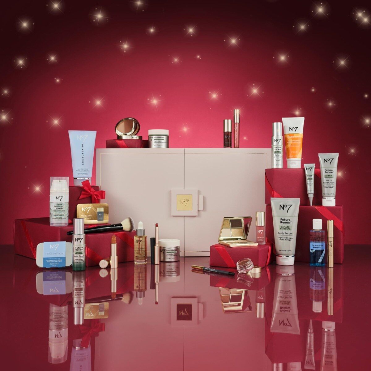 The No7 Ultimate Beauty Advent Calendar 2026 with its skincare and make-up products on a red festive set