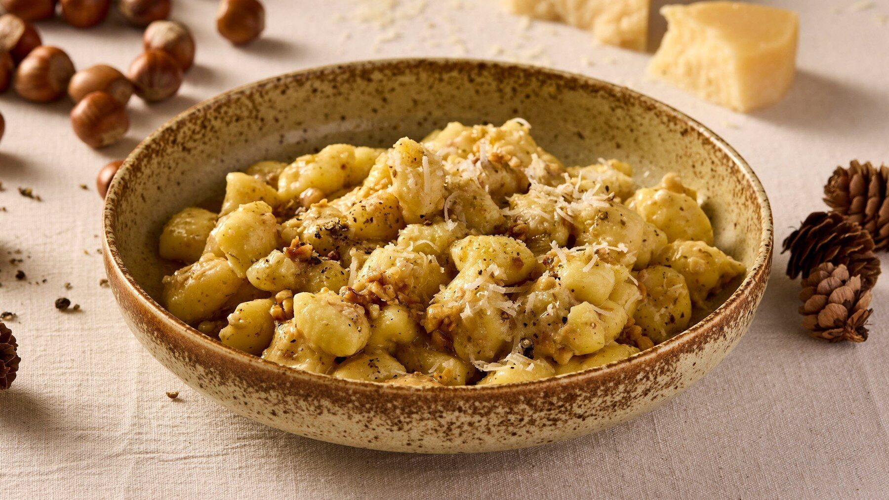 A bowl of gnocchi with hazelnut pesto and Parmigiano from Pasta Evangelists