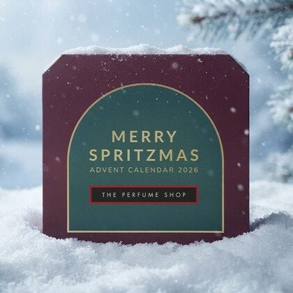 The Perfume Shop advent calendar 2026 closed, a burgundy box with a green panel reading Merry Spritzmas, sitting in snow
