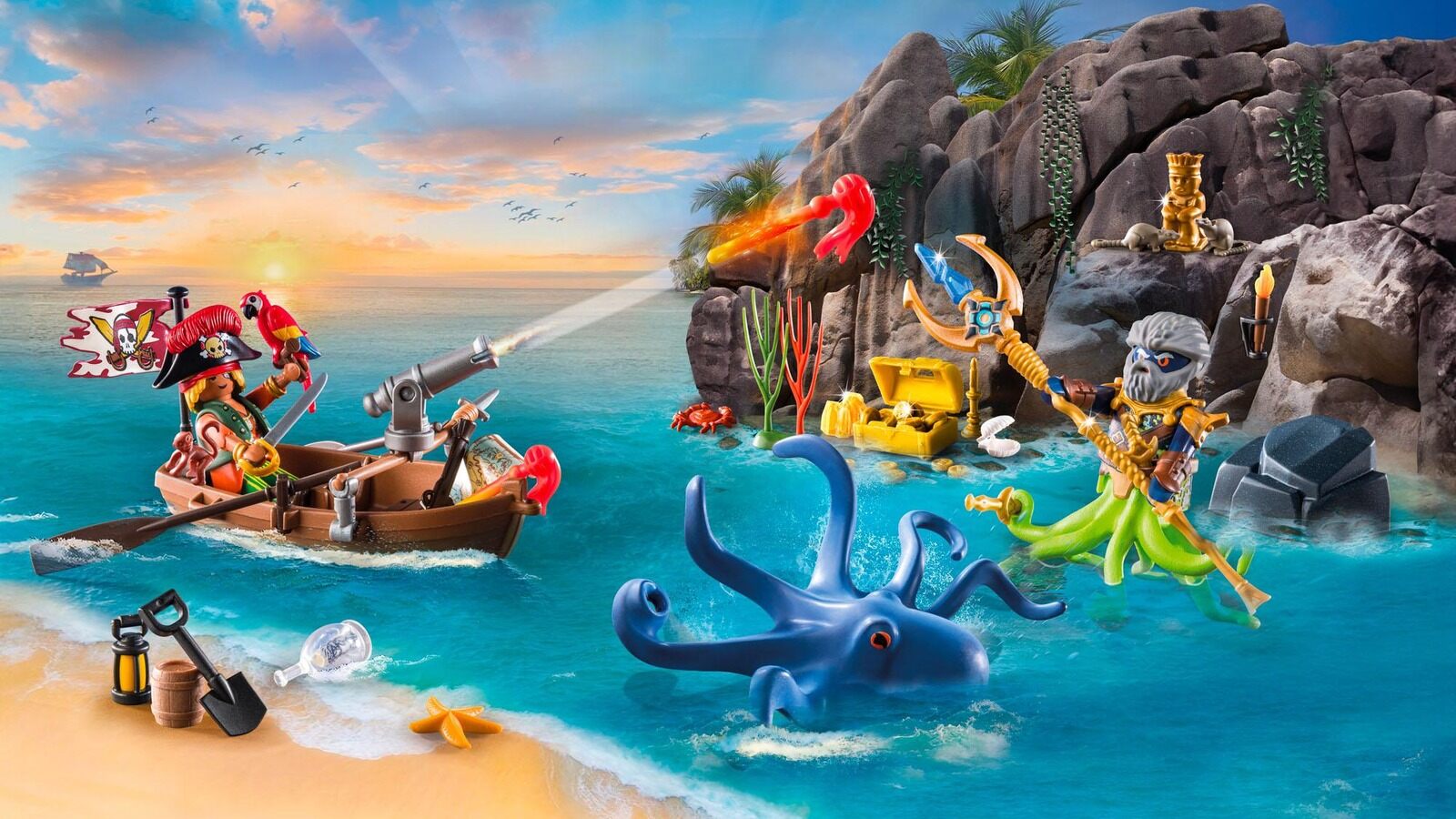 The Playmobil Pirates advent calendar scene on a beach with a rowing boat, a pirate, a treasure cave and a giant octopus