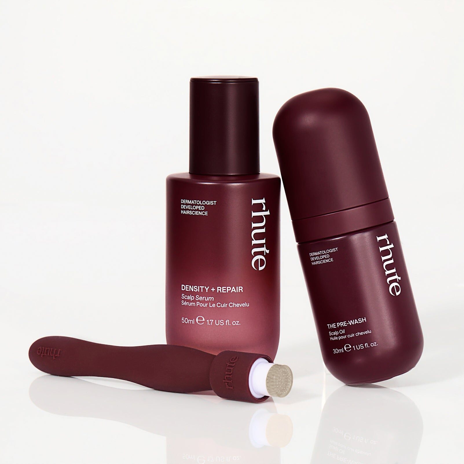 The Rhute Density Rhutine set with serum, pre-wash oil and dermastamp on a white background