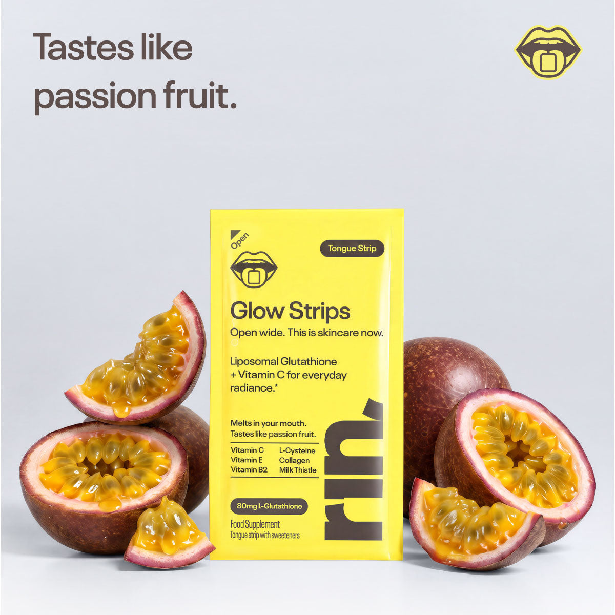 A yellow box of RIN Glow Strips standing between halved passion fruit