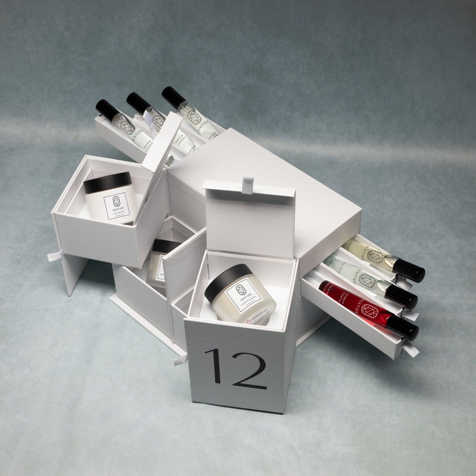 The Sentier advent calendar opened out into drawers, revealing perfume bottles and candles inside