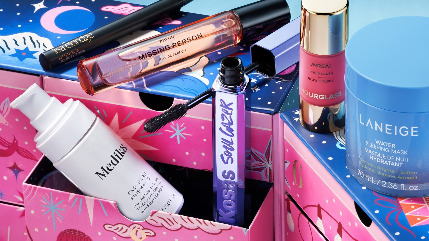 Medik8, Kosas, Hourglass and Laneige products spilling out of the Space NK advent calendar 2026