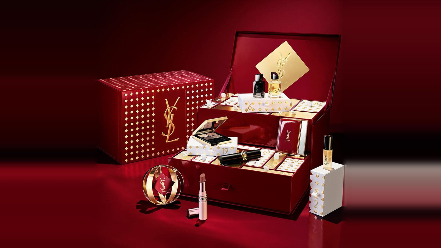 The burgundy YSL Beauty advent calendar 2026 trunk with its gold Cassandre logo